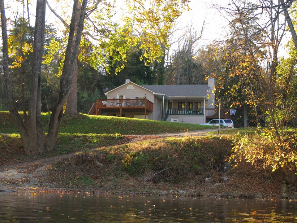 View of House from River in Fall....