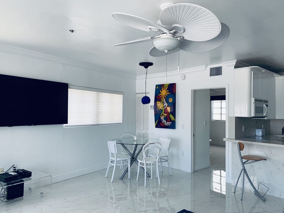 The living room with a 65” Smart Tv 