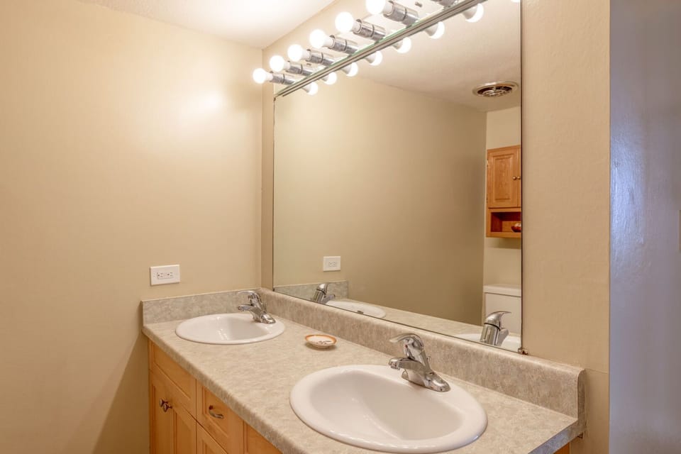 Master bathroom features dual sinks
