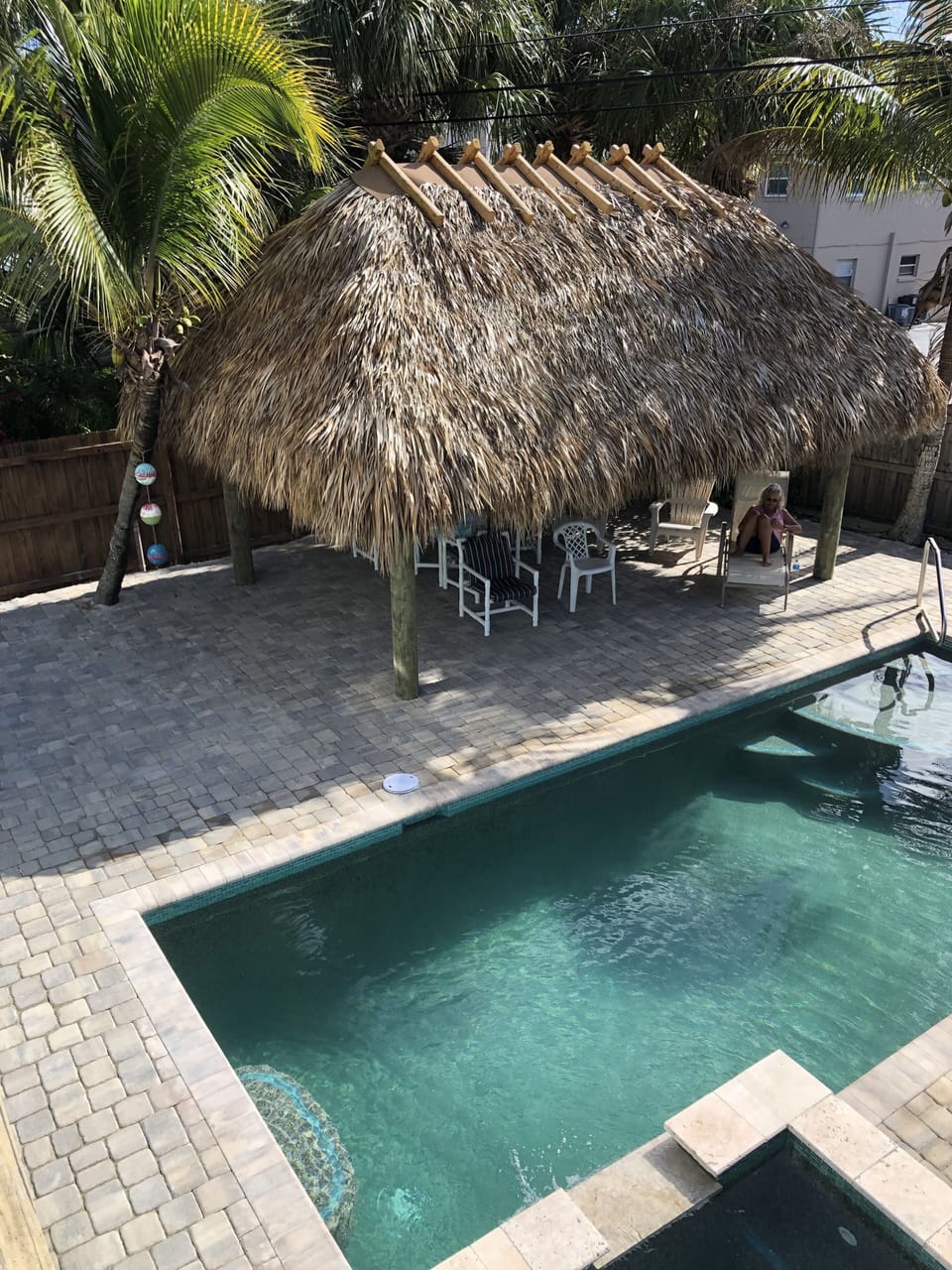 Tiki hut and pool area