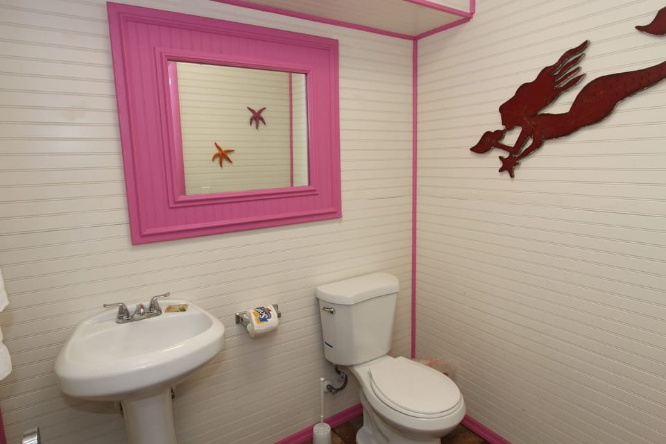 Lower Sitting and Pool Area Half-Bath