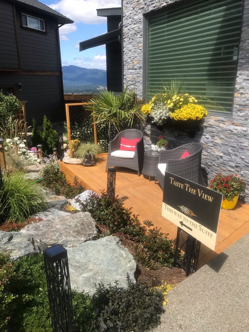 Left side of our house is a stone walkway that leads directly to the suite 