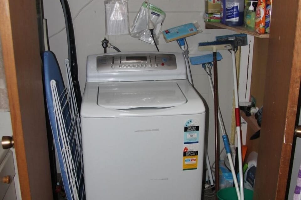 washing machine and cleaning cupboard