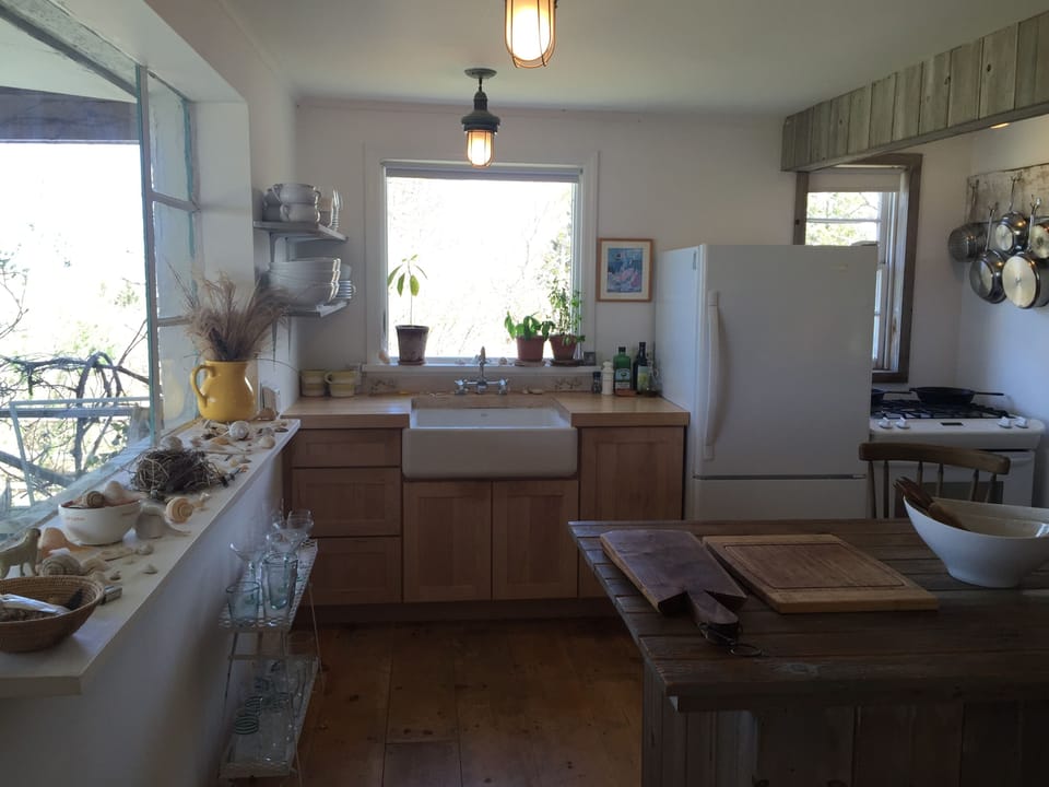 Kitchen with Farm Sink and Convection oven with views of the Bay and Beach
