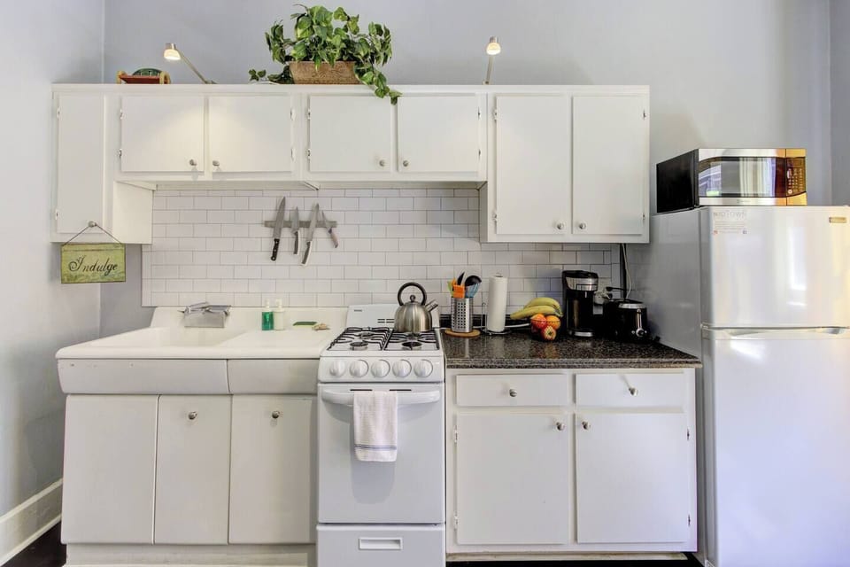 Efficient, compact kitchen with all the essentials for cooking and dining in style.