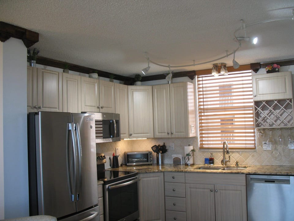 Full Size Self-Cleaning Glass Top Oven & Three (3) Door GE Refrig With Ice-Maker