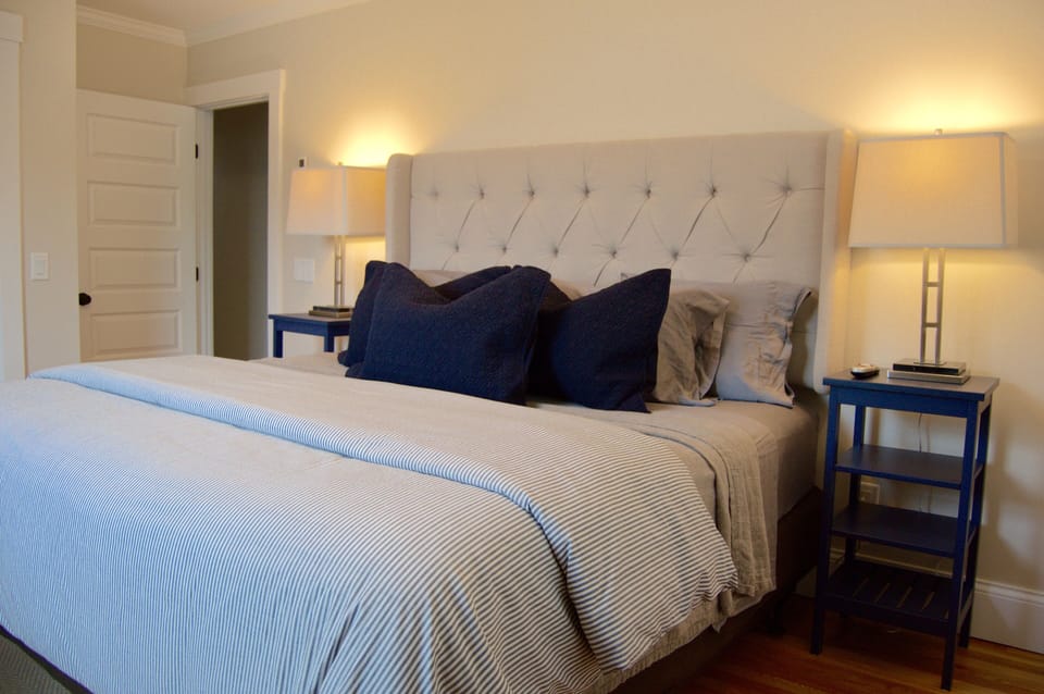 2nd Bedroom with a king size bed, large closet, and private television