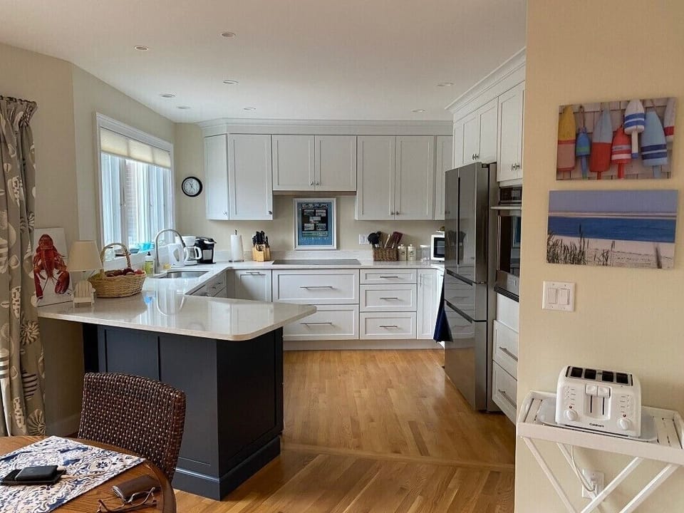 Updated kitchen large island & open dining area, designed for meals & gatherings