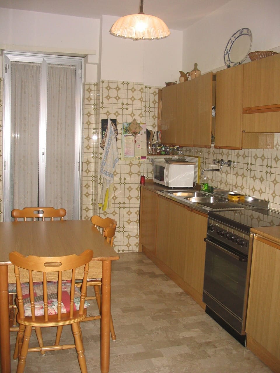 Well-equipped kitchen with table, chairs and folding bed if 3rd bedroom required