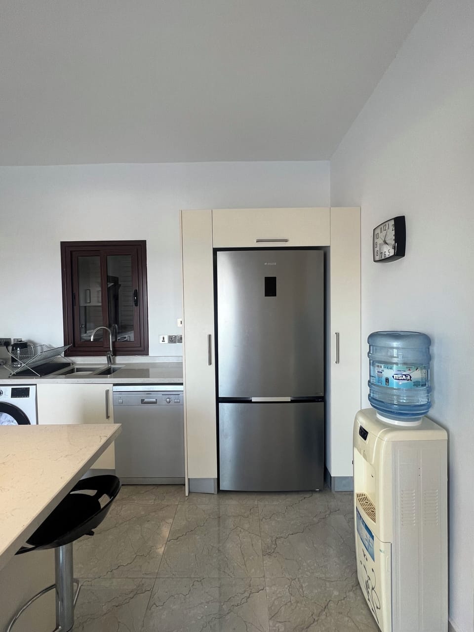 Fridge and freezer with water dispenser