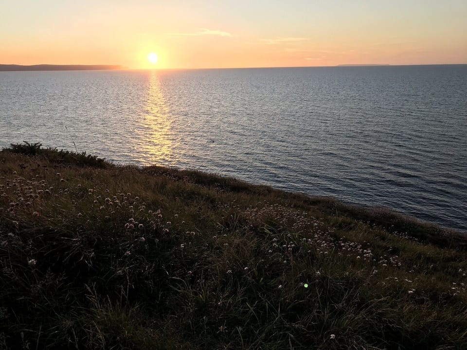 Watching the sun set over Hartland Point from Abbotsham Cliffs 