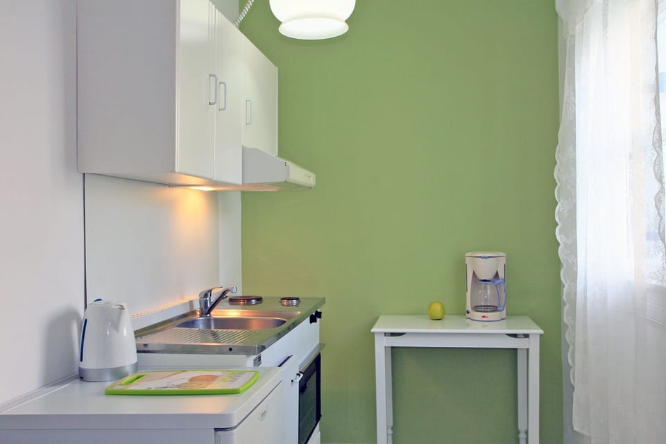 Kitchenette offers kettle and coffee maker.