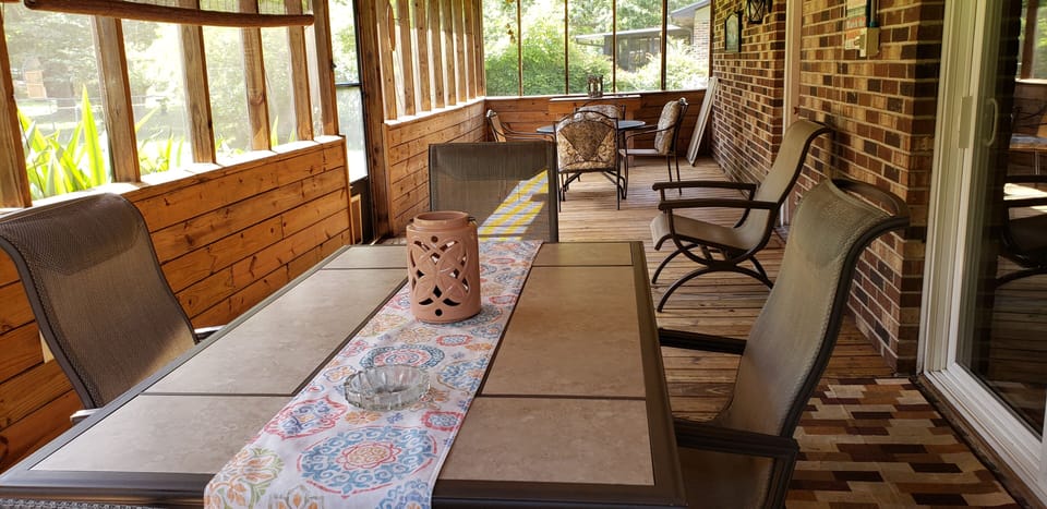 Spacious screened- in porch 