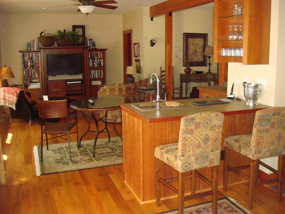 Family Room with wet bar and access to half bath