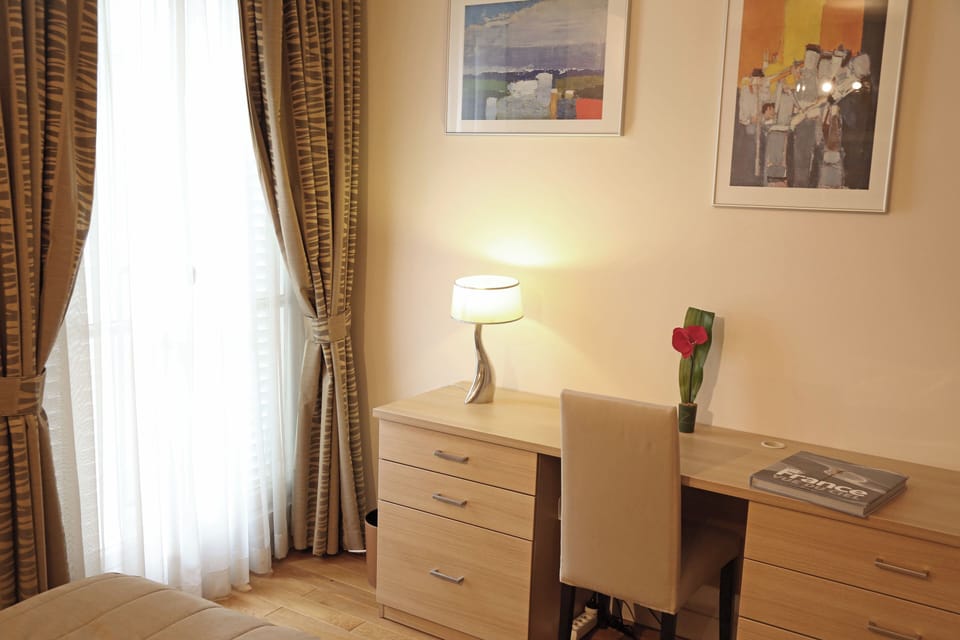 Second bedroom. New large desk and storage unit.