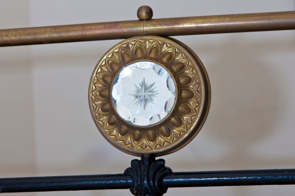 detail of antique (very solid) bed frame
