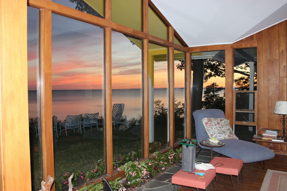 Inside in the living room looking out to the lake.