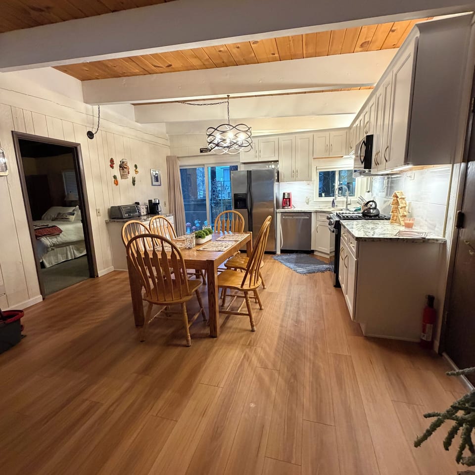 Fully stocked kitchen with gorgeous granite countertops and porcelain tile 