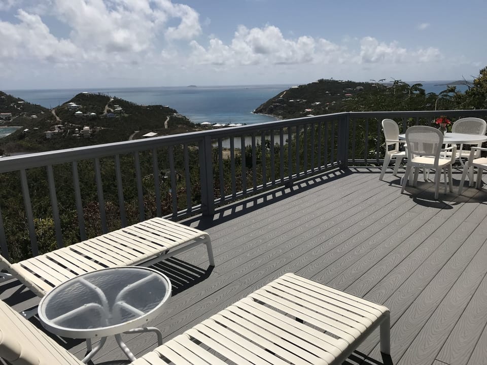 Our expansive upstairs deck is great for sunning and meals