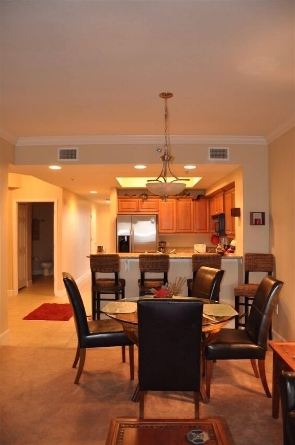 HIgh back luxury dining chairs in a luxury setting! 