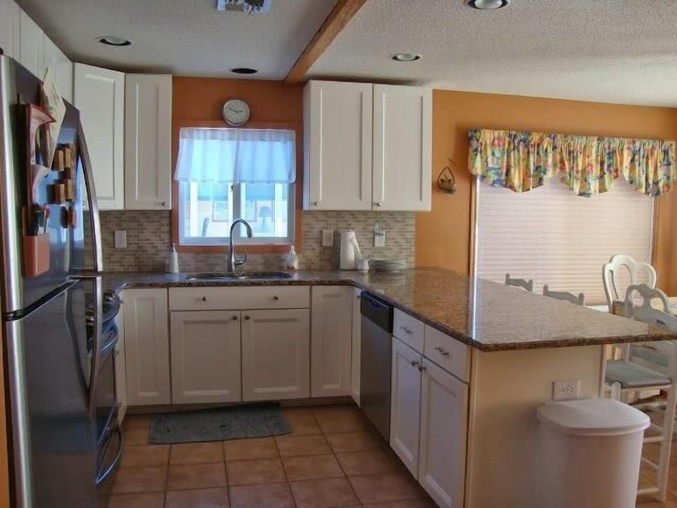 New decorator kitchen with granite and stainless steel.  
