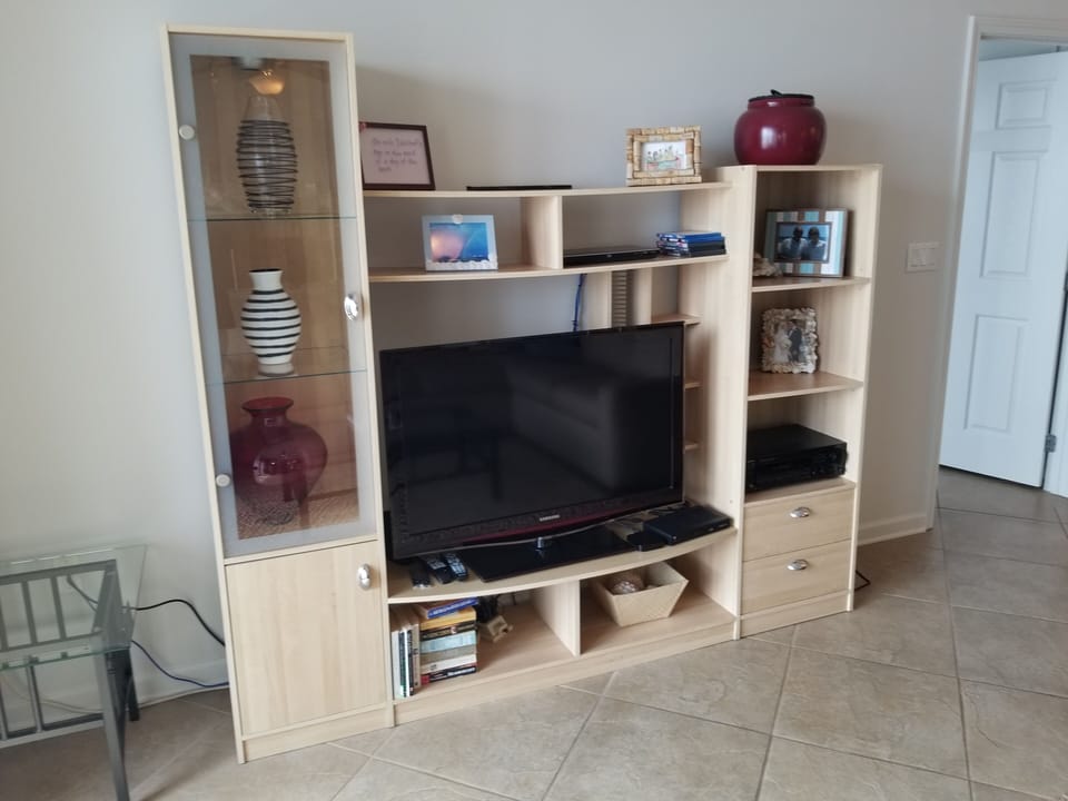 Large screen TV & Entertainment Center
