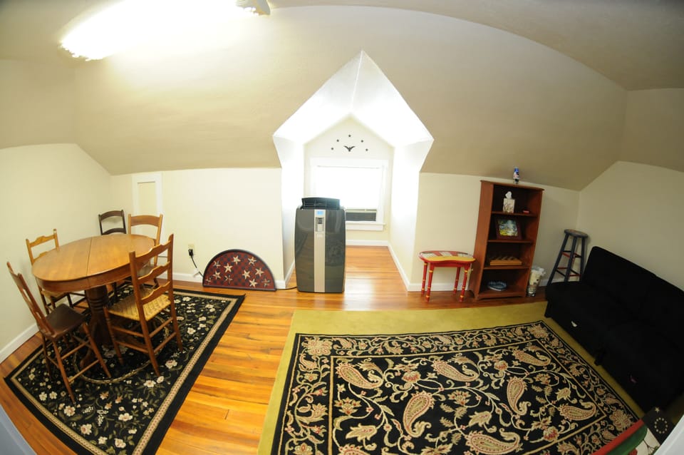 The third attic room has a game table as well as a Futon for sleep.