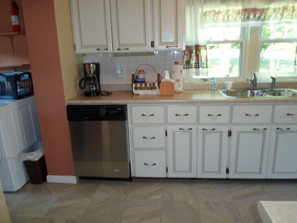 Kitchen, laundry room to the left