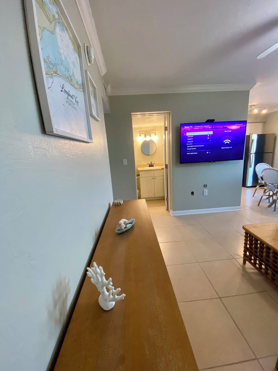 Living room leading to the bathroom.