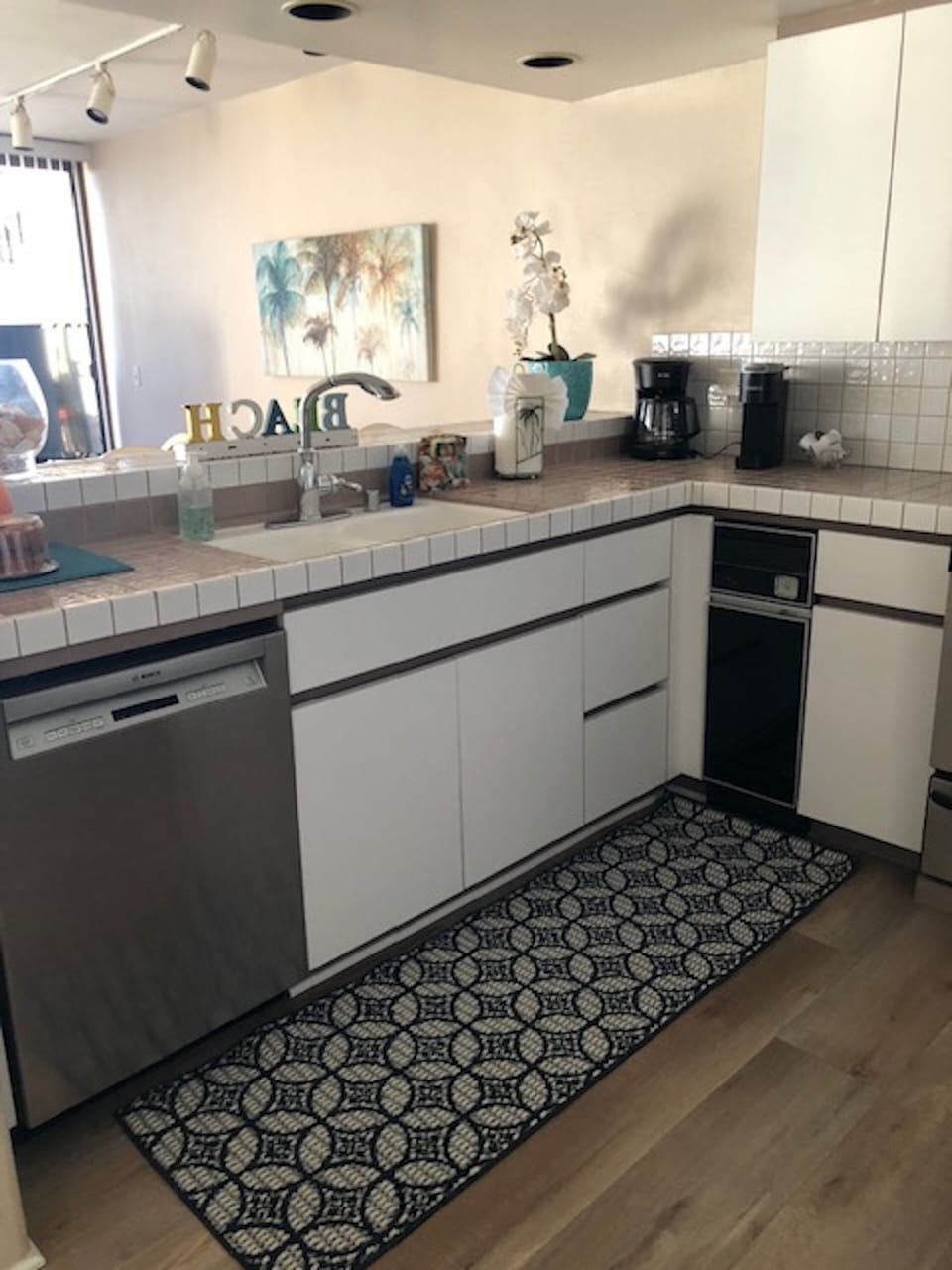 Kitchen with beautiful wood plan flooring & all the amenties  to cook/bake.