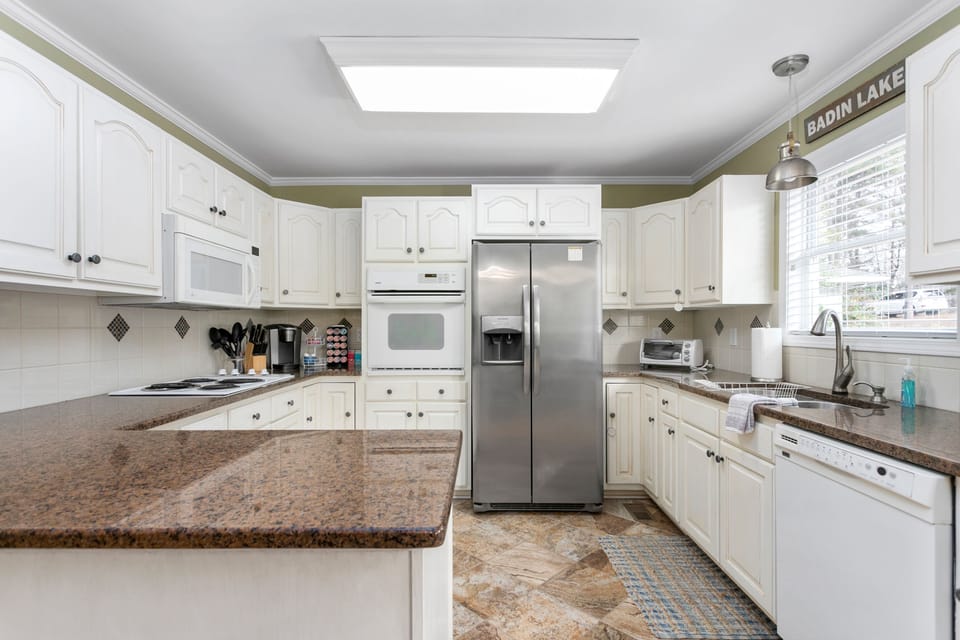 Kitchen with all the extras to make it easy to have family meals on vacation.