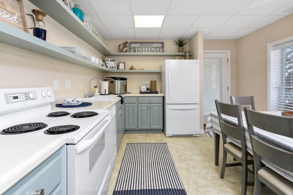 Downstairs kitchen area for the kids to enjoy games and snacks.