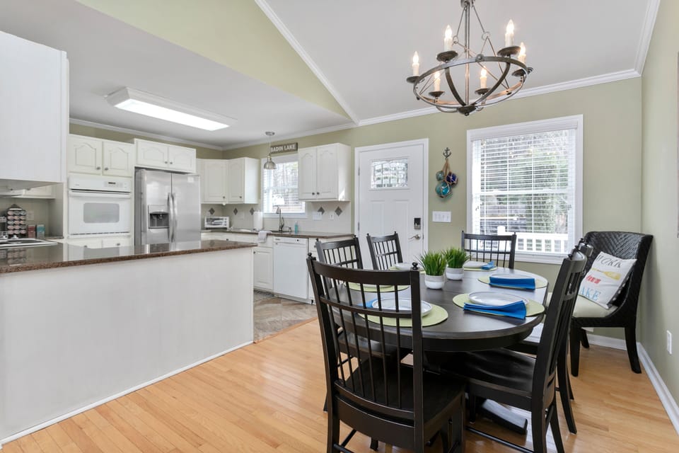 Upstairs kitchen and dining area that seats 8. 