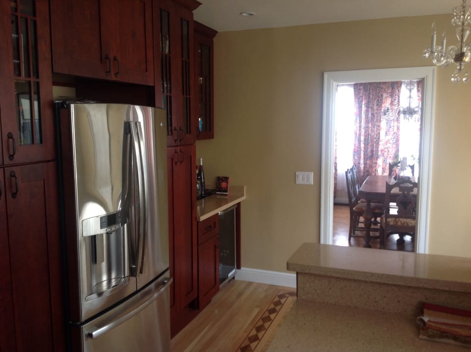 Kitchen looking into formal dining room with adjacent breakfast nook