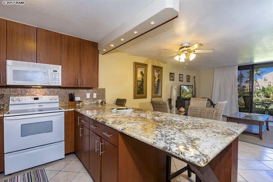 remodeled kitchen with granite countertops