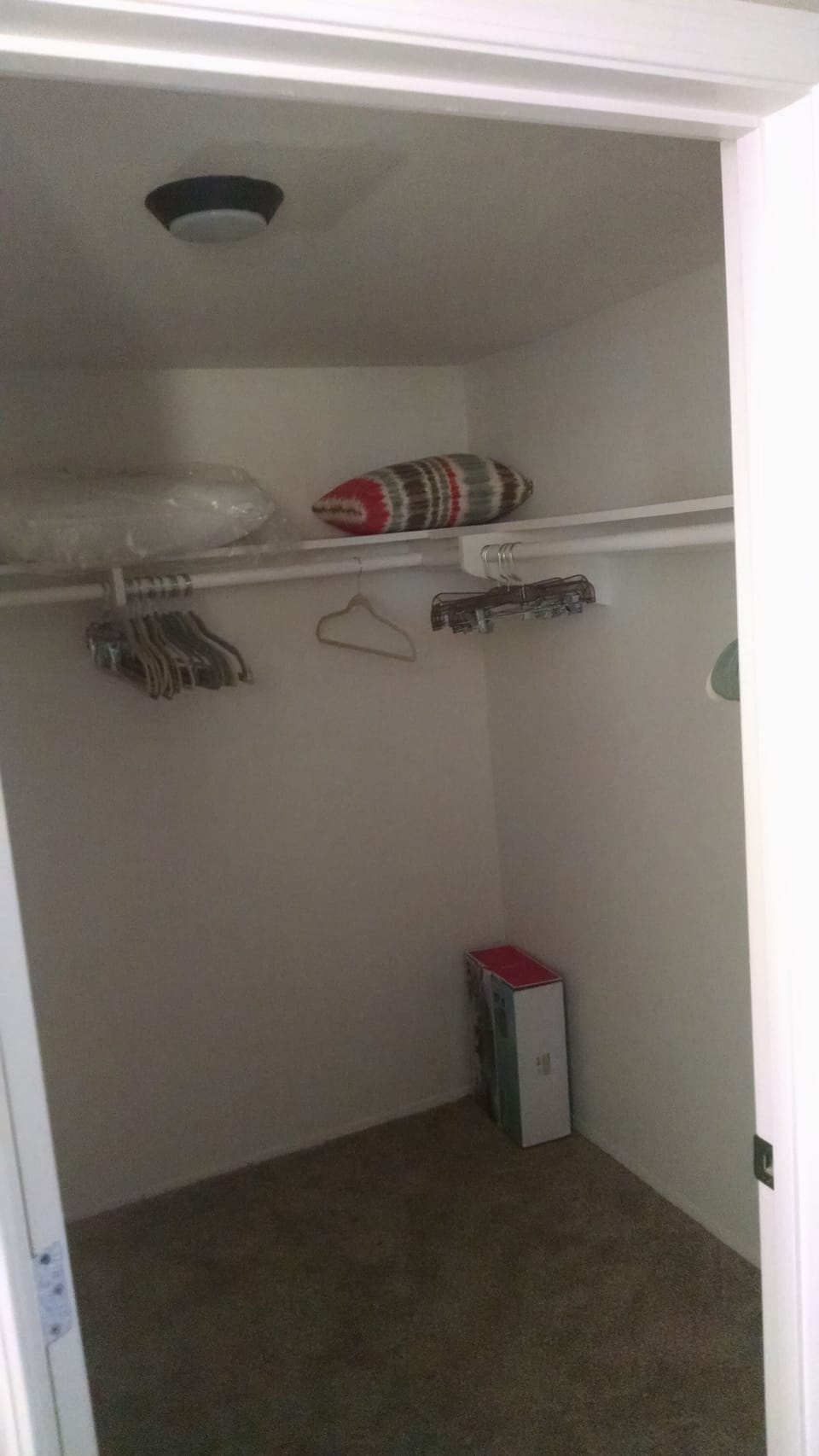 large walk-in closet in master bedroom