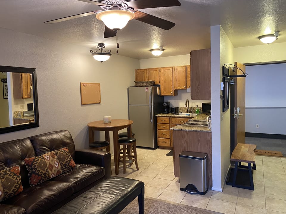 Fully-stocked eat-in kitchen with granite countertops