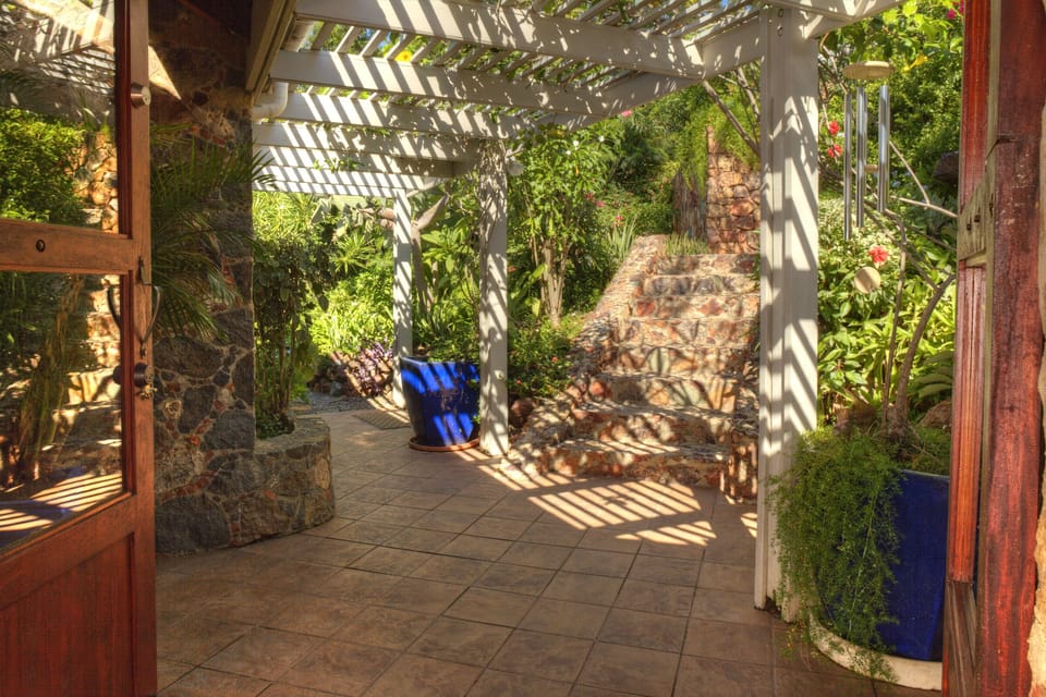 Descend the Stone Steps through Andante's Gardens to the Entrance