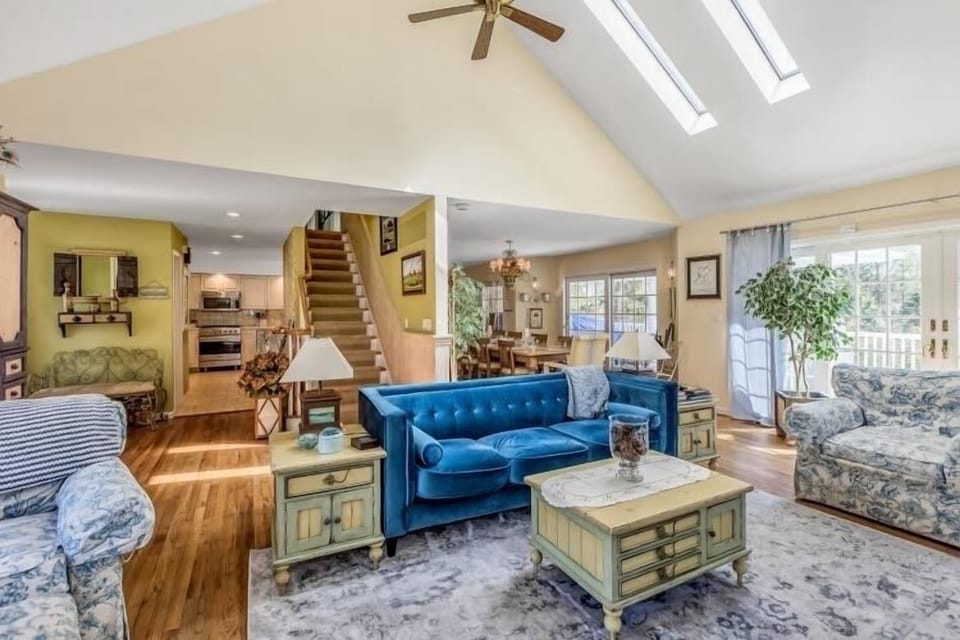 Large family room area with lots of natural lighting. 