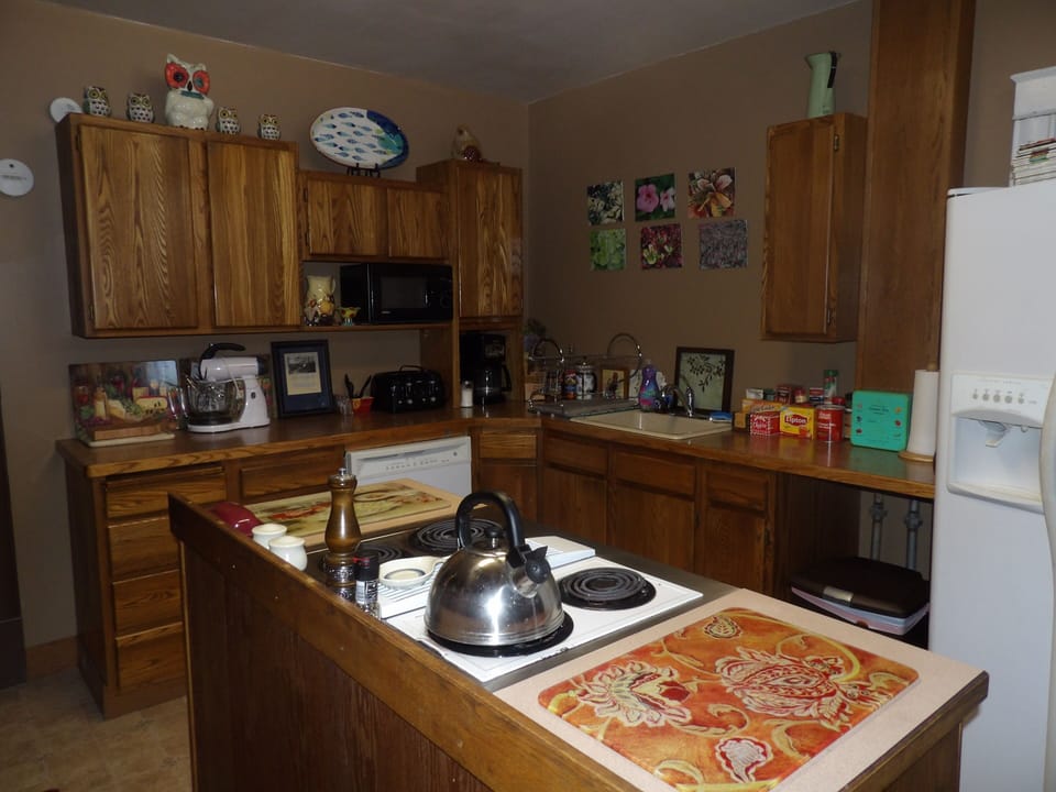 Kitchen, view from full bathroom. 