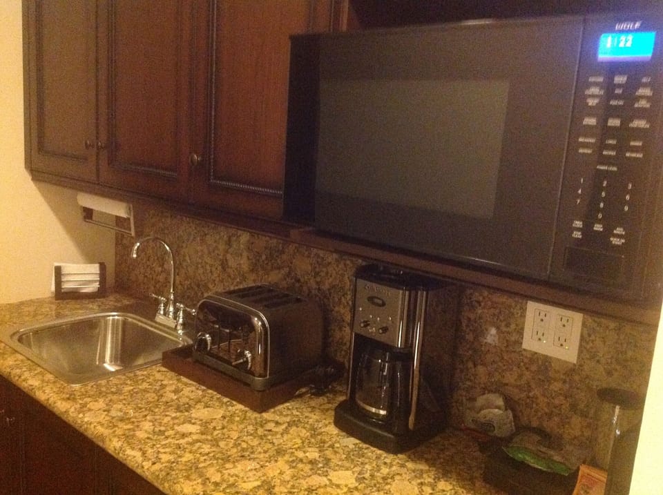 Galley kitchens in both guest bedrooms
