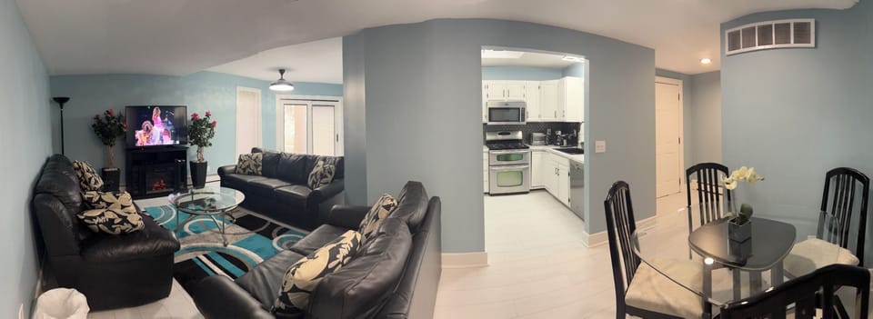 Panoramic view of the living area excluding the bedrooms and the bathrooms.