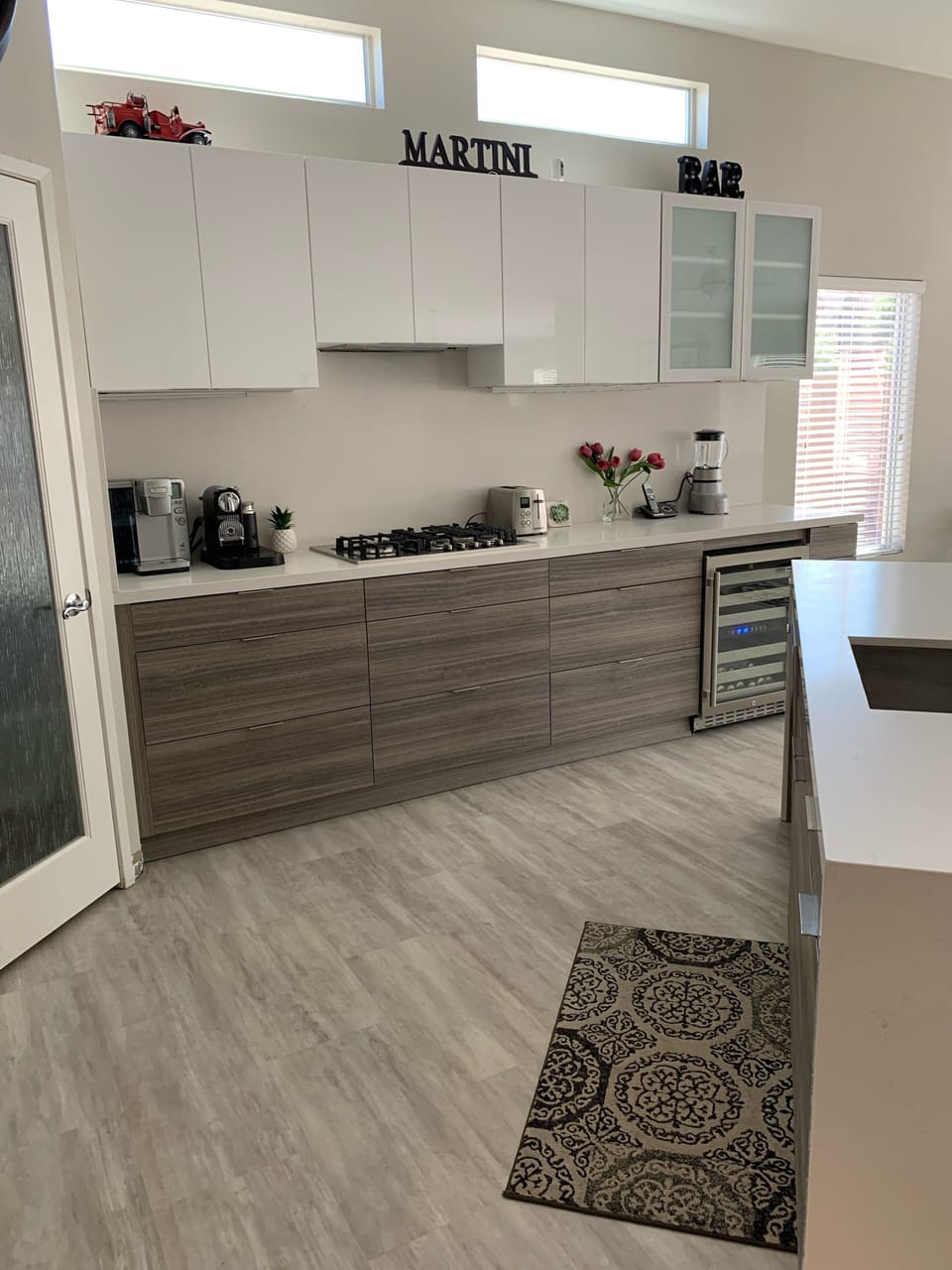 brand new kitchen with bar fridge