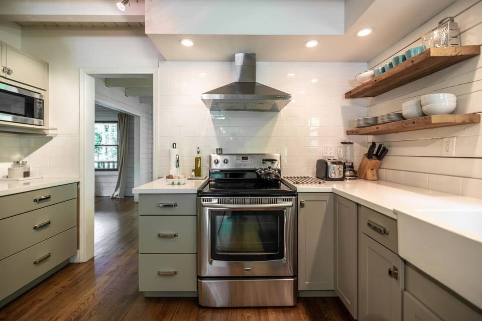 The spacious eat-in kitchen is fully stocked with all of the cooking and dining essentials you may need for your stay.  
