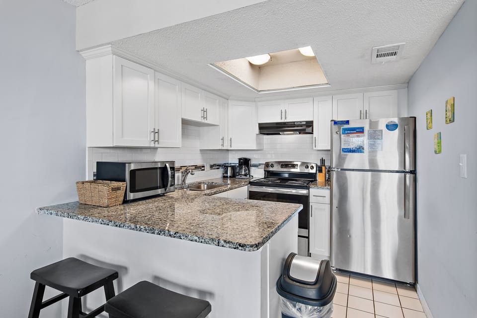 Kitchen with breakfast bar.
