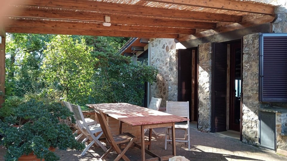 Marble table on the front terrace adj. to the kitchen