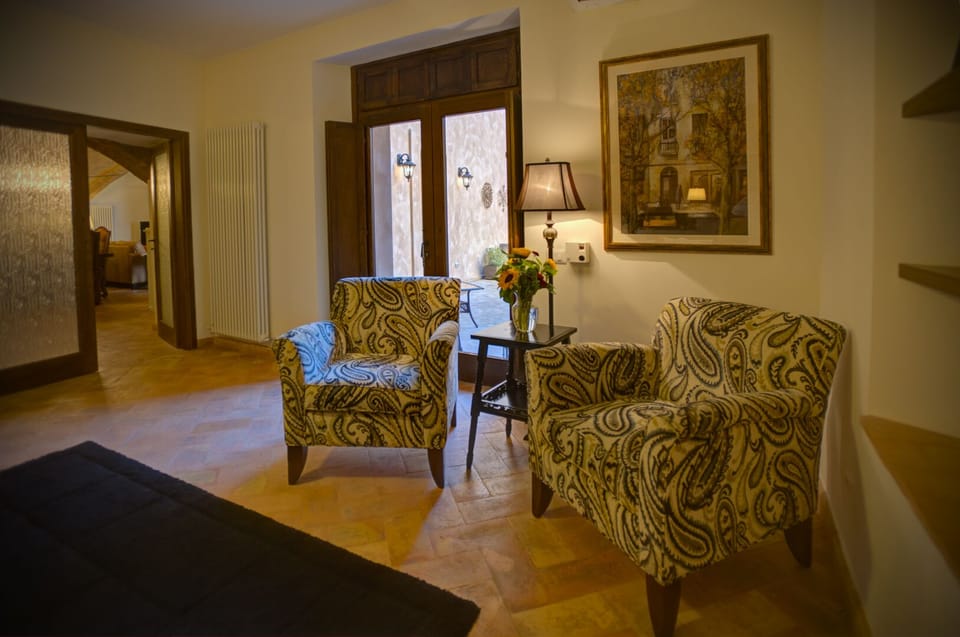Seating area and terrace access in Master bedroom.