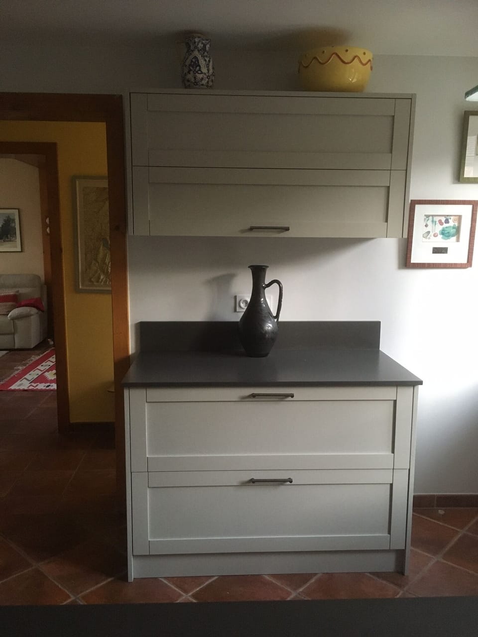Kitchen, with sitting room in the background