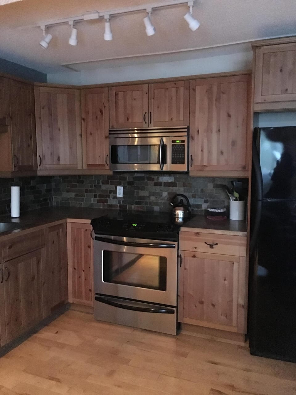 Microwave and range.  Full size refrigerator/freezer and dishwasher.