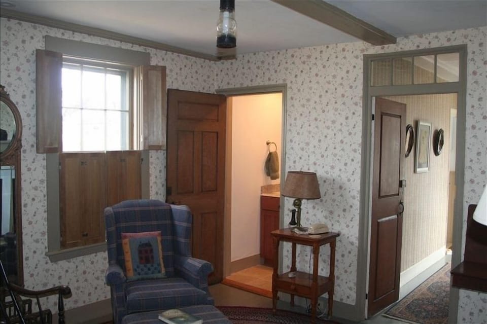 Upstairs Parlor with half bath.